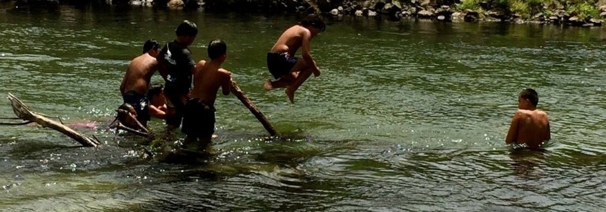 kids swimming in river