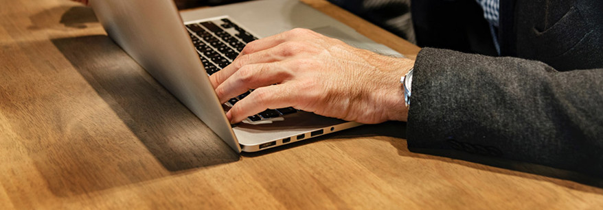 person using laptop