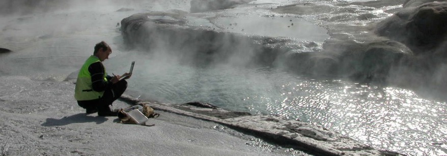 Staff recording geothermal data
