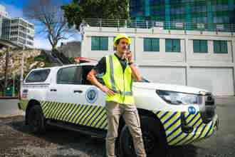 Civil Defence staff and vehicle